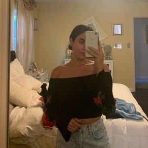 Black off the shoulder top with rose detailing